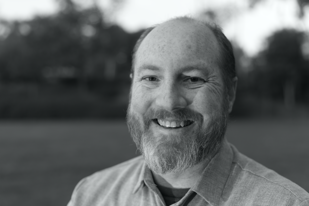 A Portrait of Nathan R. Brown smiling